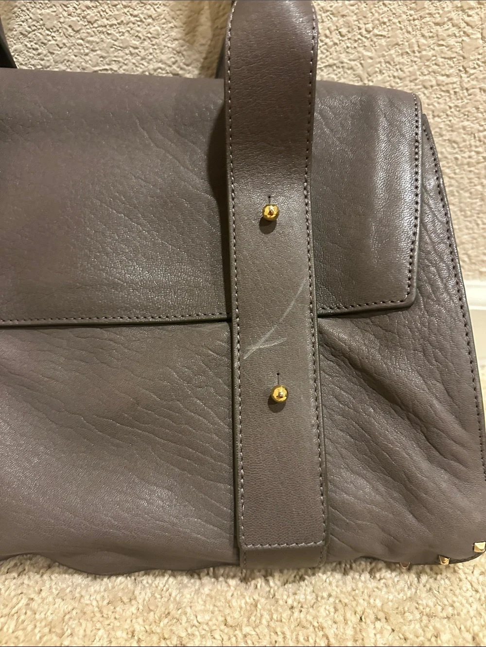 Marc Jacobs Taupe Stanton Leather Top-Handle Satchel with Gold Hardware.